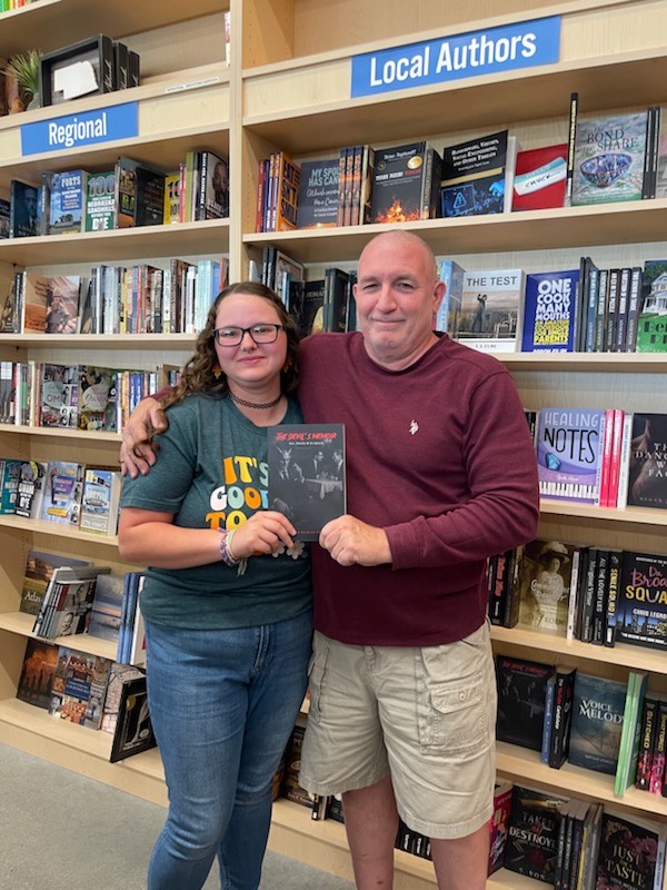 Sean Patrick Page with reader at bookstore signing